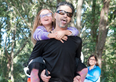 Jogging Father Carrying His Daughter on his Back