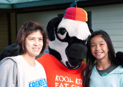 Girl Posing with the Chick-fil-a Cow